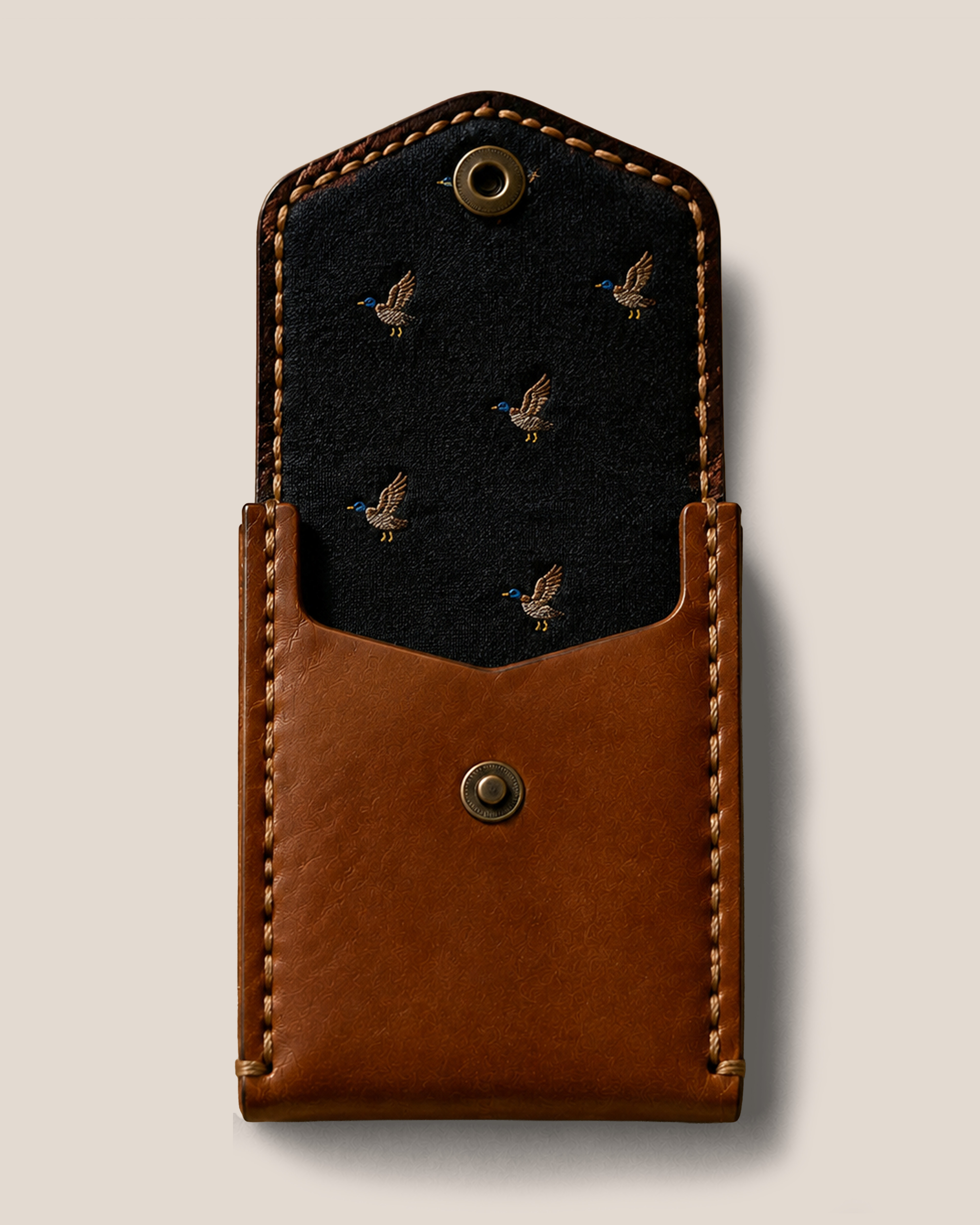 A Carry 00 piece open, showing its reclaimed silk lining