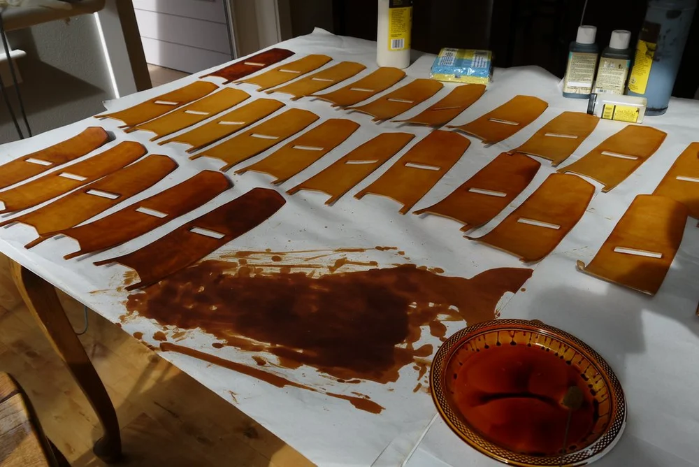 Tan dye on cut panels
